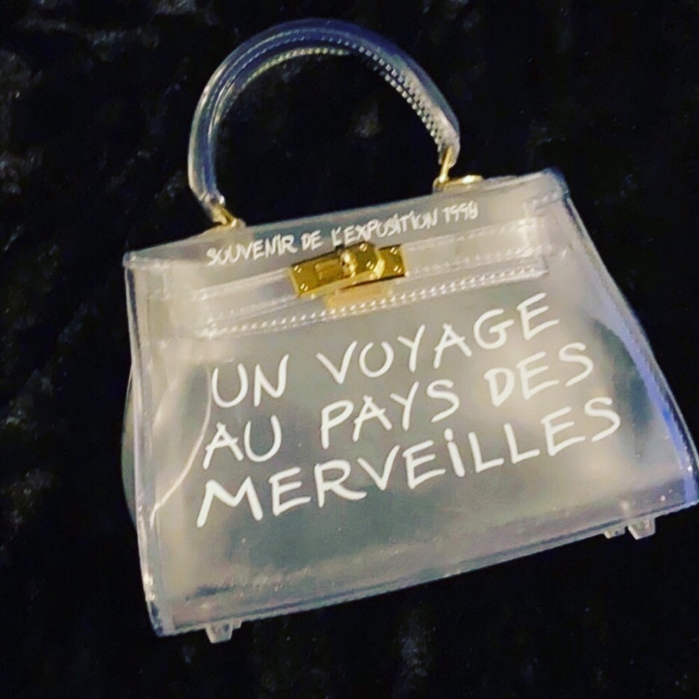 Un Voyage pvc handbag mini
